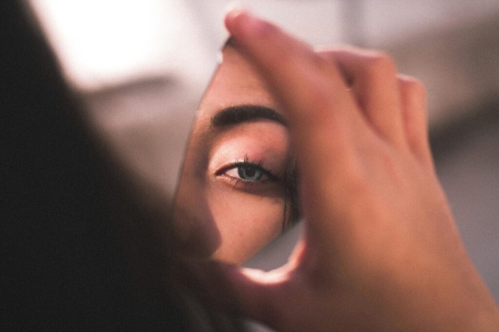 Photo by Ismael Sánchez from Pexels: https://www.pexels.com/photo/reflection-of-woman-s-eye-on-broken-mirror-2282000/