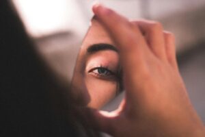 Photo by Ismael Sánchez from Pexels: https://www.pexels.com/photo/reflection-of-woman-s-eye-on-broken-mirror-2282000/