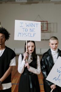 Group holding signs for self-identity